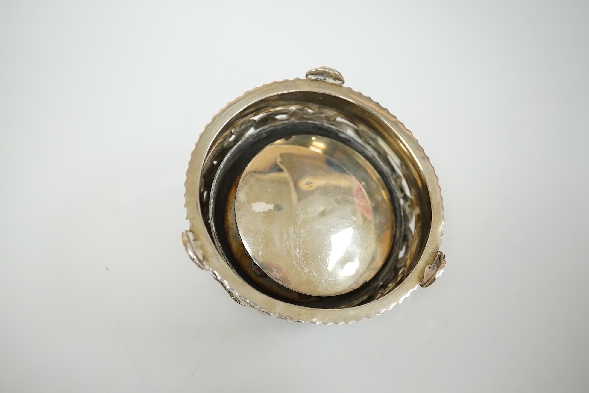 An Edwardian pierced silver table bell, by Deakin & Francis, Birmingham, 1903, diameter 82mm. Condition - poor